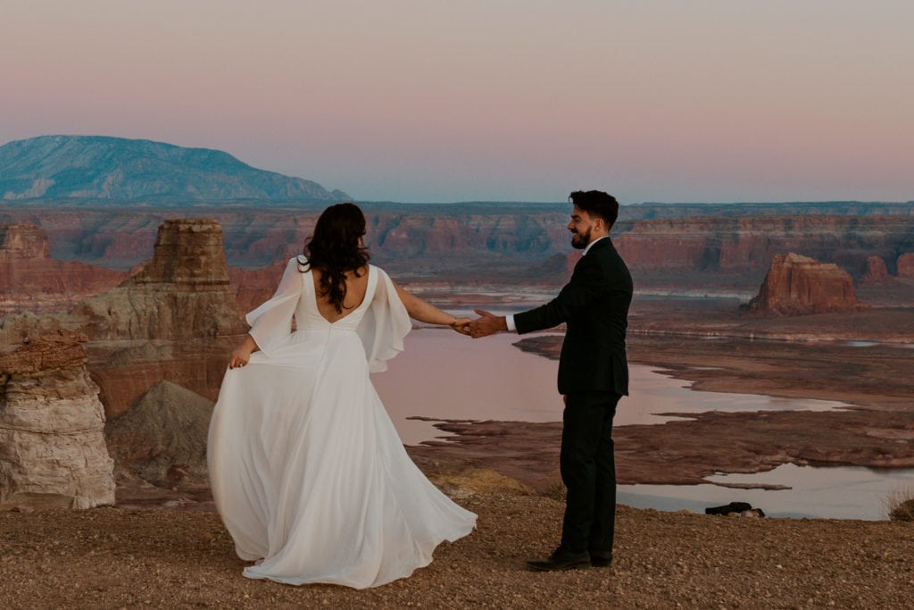 Bride and groom dancing after their Lake Powell elopement