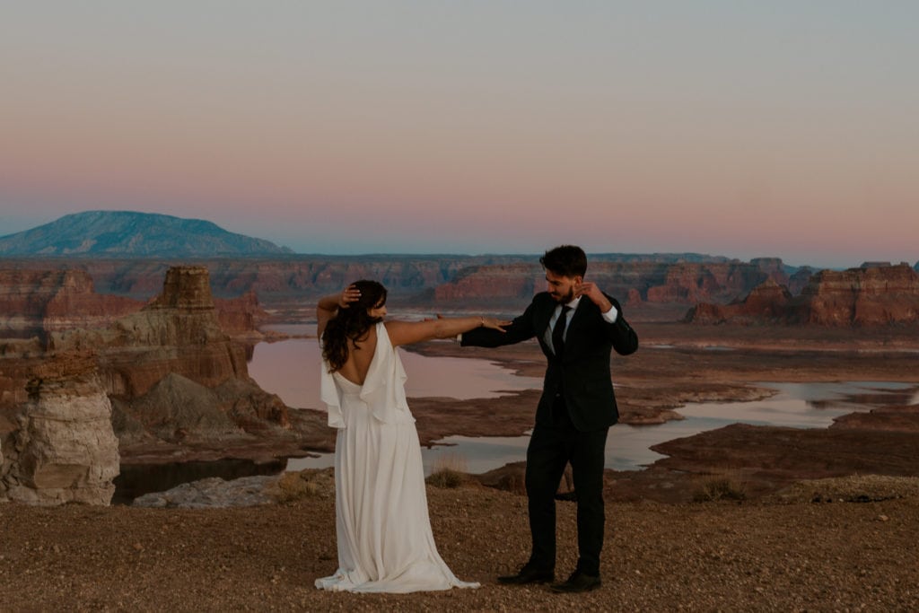 Bride and groom dancing after their Lake Powell elopement
