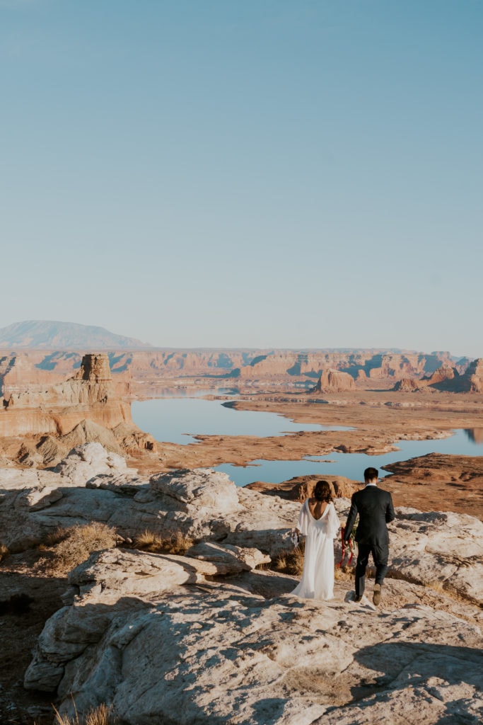 Bride and groom at their elopement ceremony in Lake Powell, Utah