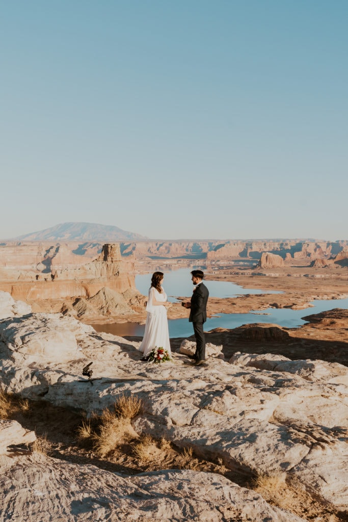 Bride and groom at their elopement ceremony in Lake Powell, Utah