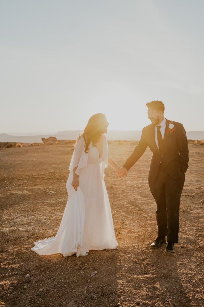 Bride and groom smiling after their lake powell elopement
